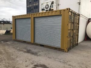 40273643_2030194867074485_7848831976415952896_n-2.jpg Yellow 20ft Used Container – Dual Side Roll-Up Doors
